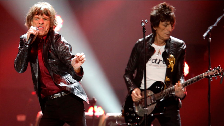 rollking stones jagger wood sandy show 660 reuters.jpg